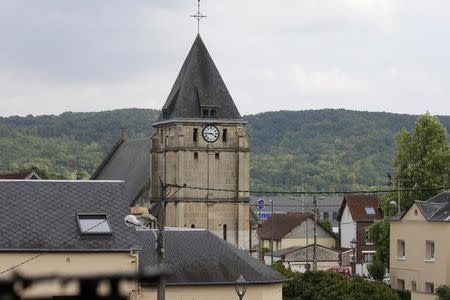 The bell tower of the church is seen after a hostage-taking in Saint-Etienne-du-Rouvray near Rouen in Normandy, France, July 26, 2016. REUTERS/Pascal Rossignol