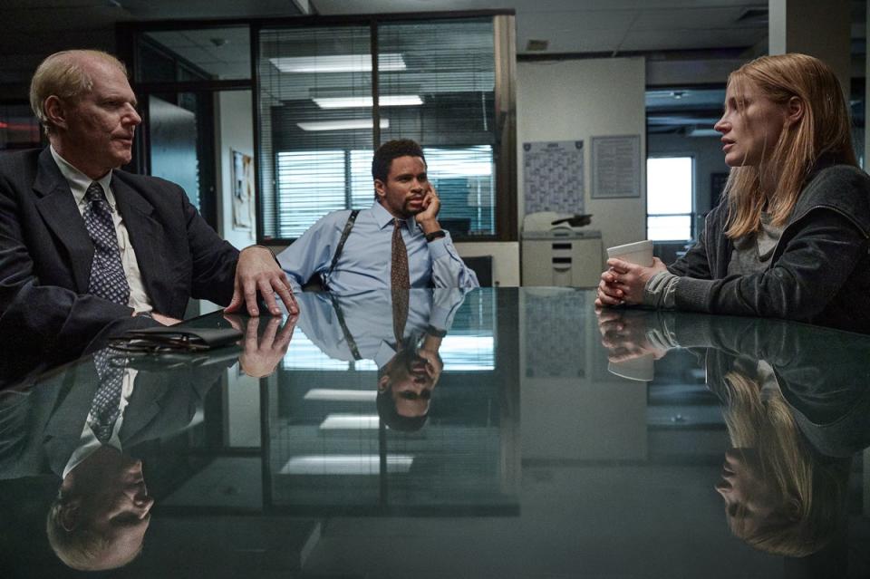 Noah Emmerich and Nnamdi Asomugha as detectives Tim Braun and Danny Baldwin, and Jessica Chastain as Amy Loughren (JoJo Whilden / Netflix)