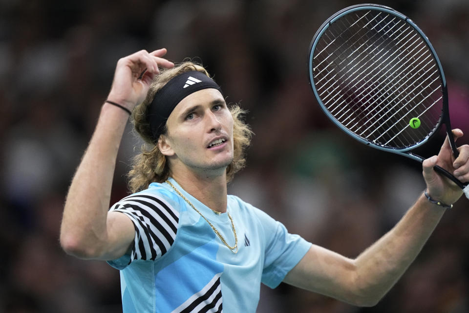 Germany's Alexander Zverev reacts as he plays Greece's Stefanos Tsitsipas during their third round match of the Paris Masters tennis tournament, at the Accor Arena, Thursday Nov. 2, 2023 in Paris. (AP Photo/Michel Euler)
