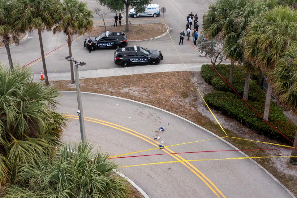 Riviera Beach police investigate a shooting on Monday, April 22, 2024, in the parking lot at Suncoast High School.