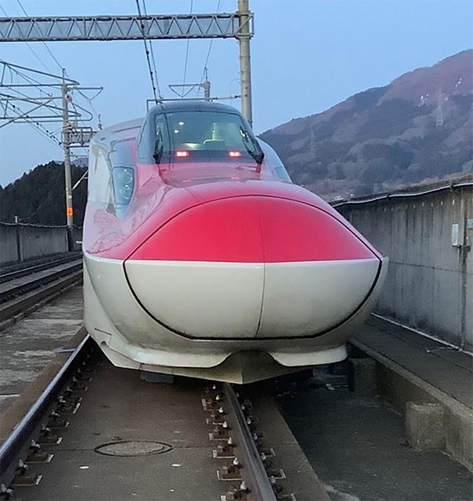 This photo was released by the JR East Japan Railway Company showing a derailed 