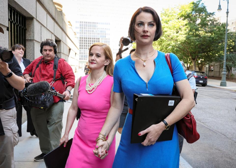 Sarah Ransome and Elizabeth Stein, victims of Jeffery Epstein, arrive for the sentencing of the Ghislaine Maxwell trial (REUTERS)