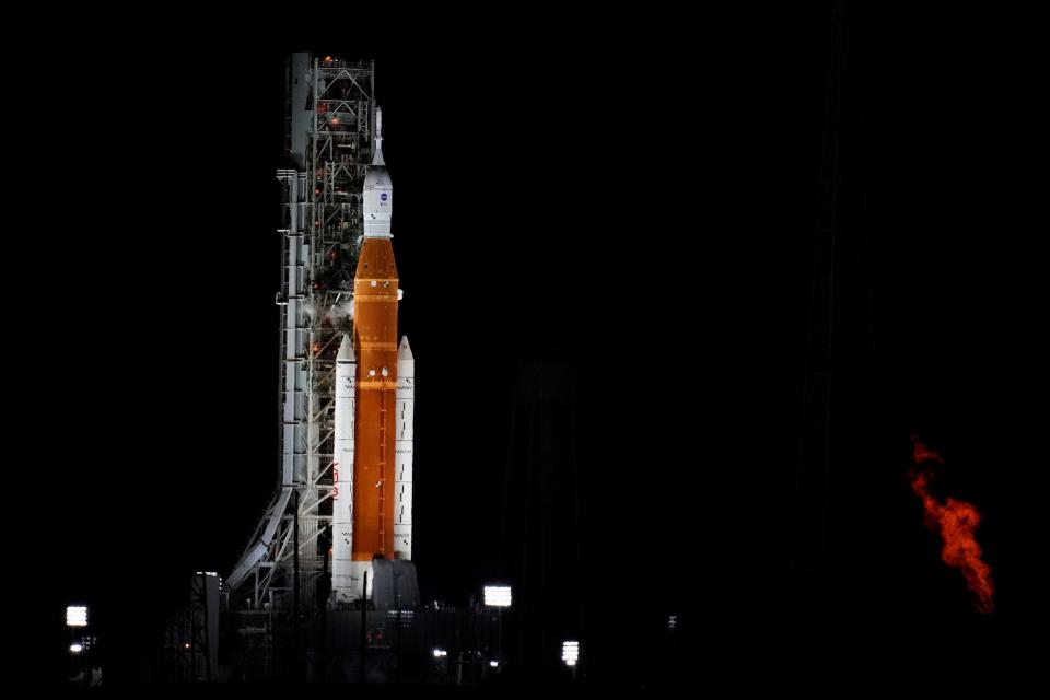 NASA's new moon rocket sits on Launch Pad 39-B hours before liftoff Monday, Aug. 29, 2022, in Cape Canaveral, Fla.