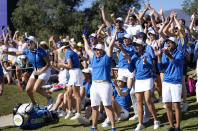 Members of the Europe team celebrate after the match between Europe's Carlota Ciganda and United States' Nelly Korda at the Solheim Cup golf tournament in Finca Cortesin, near Casares, southern Spain, Sunday, Sept. 24, 2023. Europe play the United States in this biannual women's golf tournament, which played alternately in Europe and the United States. (AP Photo/Bernat Armangue)