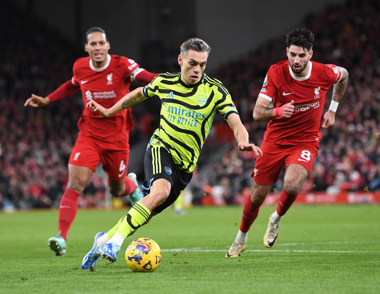 Arsenal forward Leandro Trossard (centre) takes on Liverpool's Virgil van Dijk (left) and Dominik Szoboszlai in their English Premier League match at Anfield. 