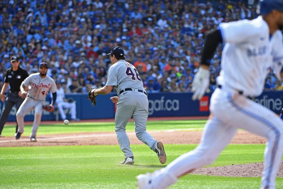 Tigers reliever Derek Law gave up four runs Saturday against the Blue Jays, but all were unearned after this drop by him.