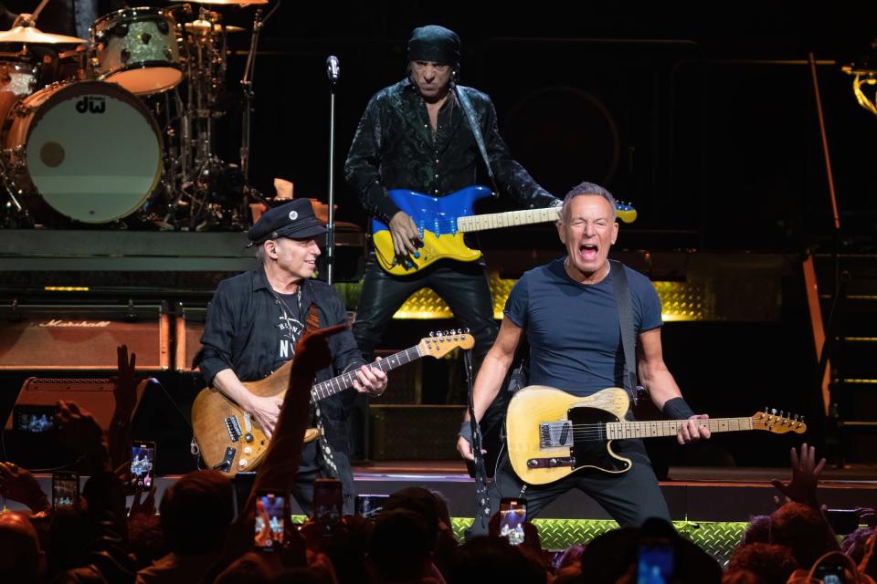 Nils Lofgren, Steven Van Zandt and Bruce Springsteen perform onstage on Feb. 16 at the Moody Center.