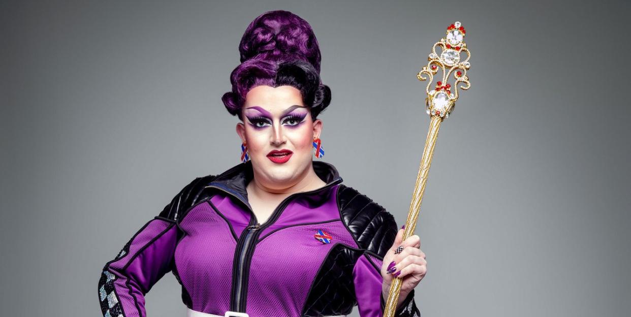 lawrence chaney posing during rupaul's drag race uk season 2 final photoshoot