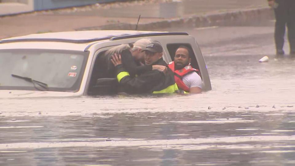 Woman rescued from floodwaters in Lawrence