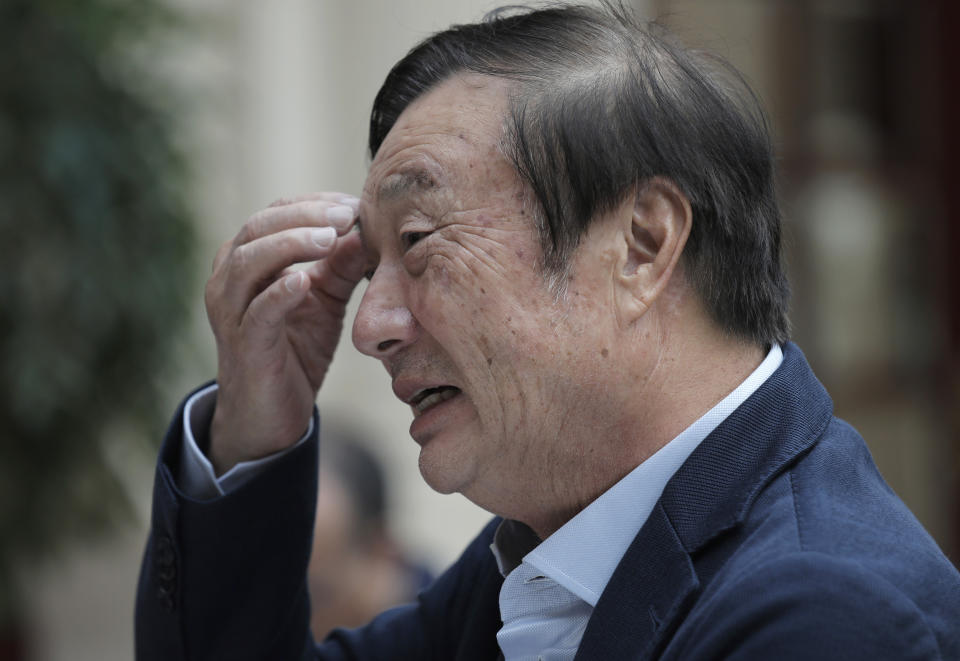 Ren Zhengfei, founder and CEO of Huawei, scratches his forehead during a round table meeting with the media in Shenzhen city, south China's Guangdong province, Tuesday, Jan. 15, 2019. The founder of network gear and smart phone supplier Huawei Technologies said the tech giant would reject requests from the Chinese government to disclose confidential information about its customers. (AP Photo/Vincent Yu)