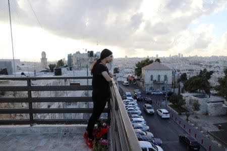 Palestinian Tamara Abu-Laban, 16, looks at the view from a rooftop during her interview with Reuters at her house in East Jerusalem October 8, 2017. Picture taken October 8, 2017. REUTERS/Ammar Awad