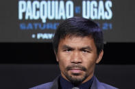 Manny Pacquiao, of the Philippines, attends a news conference Wednesday, Aug. 18, 2021, in Las Vegas. Pacquiao is scheduled to fight Yordenis Ugas, of Cuba, in a welterweight championship bout Saturday in Las Vegas. (AP Photo/John Locher)