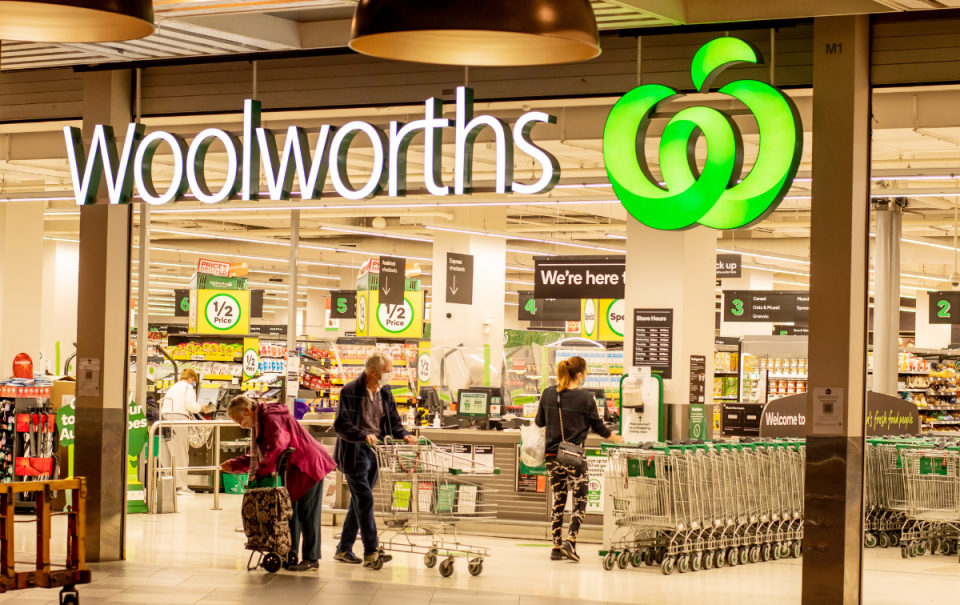 Shoppers at Woolworths storefront