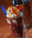 This liquid s'mores shake from <a href="http://holsteinslv.com/" rel="nofollow noopener" target="_blank" data-ylk="slk:Holsteins Shakes and Buns;elm:context_link;itc:0;sec:content-canvas" class="link ">Holsteins Shakes and Buns</a> in Las Vegas is spiked with Smirnoff Marshmallow Vodka for an adults-only treat.
