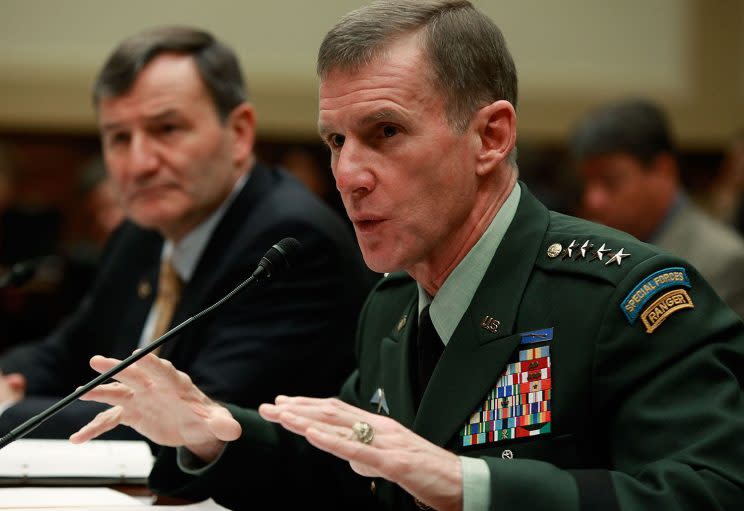 U.S. Army Gen. Stanley McChrystal (R), commander of the International Security Assistance Force and commander of United States Forces Afghanistan and Karl Eikenberry (L), U.S. Ambassador to Afghanistan, participate in a House Foreign Affairs Committee hearing on Capitol Hill, on December 10, 2009 in Washington, D.C. 