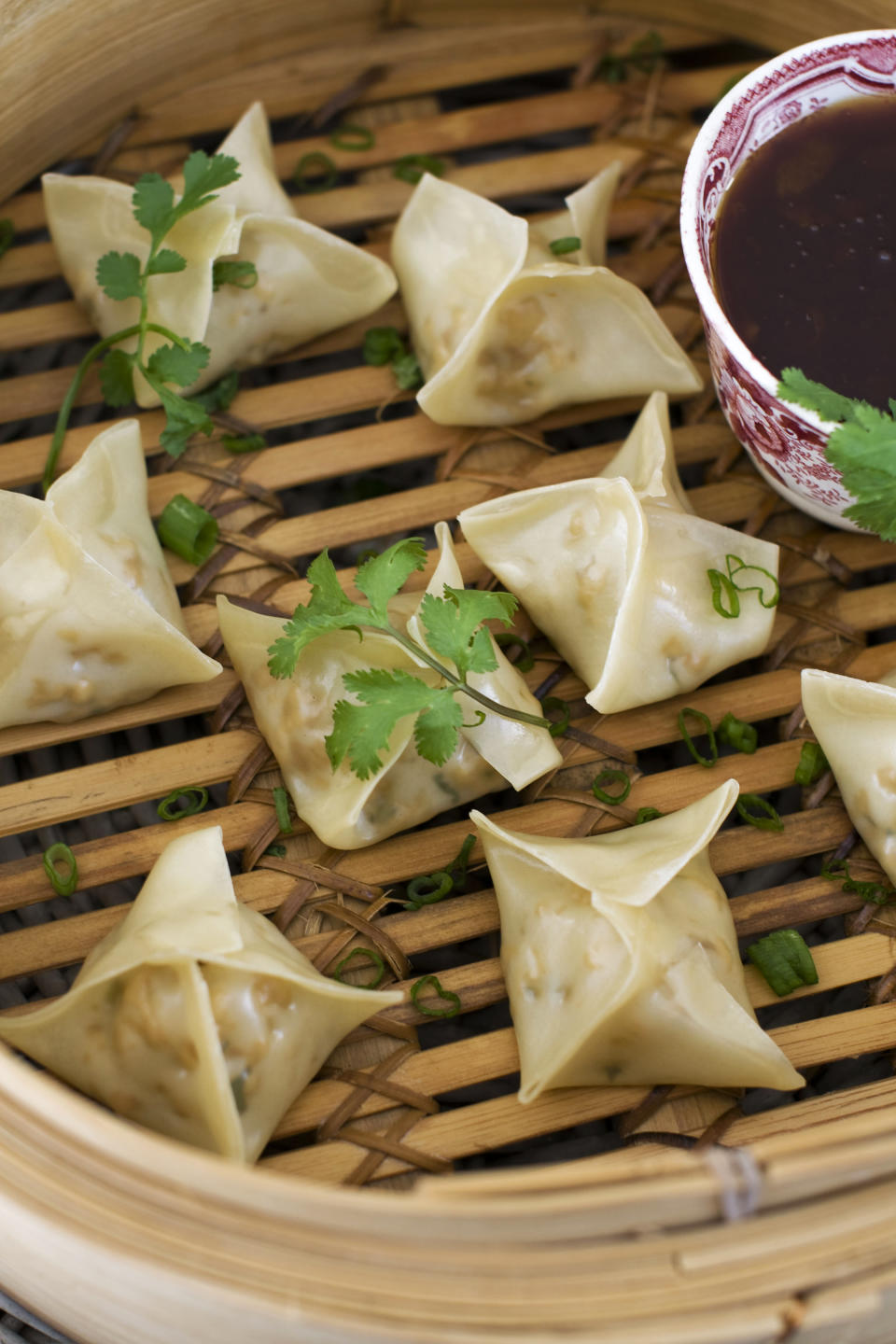 In this image taken on January 14, 2013, vegetarian steamed dumplings with sweet-and-sour sauce are shown in Concord, N.H. (AP Photo/Matthew Mead)