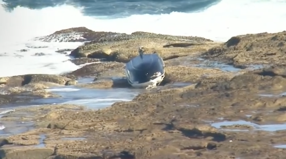 An overturned boat at the scene on Sunday afternoon. Source: Nine News