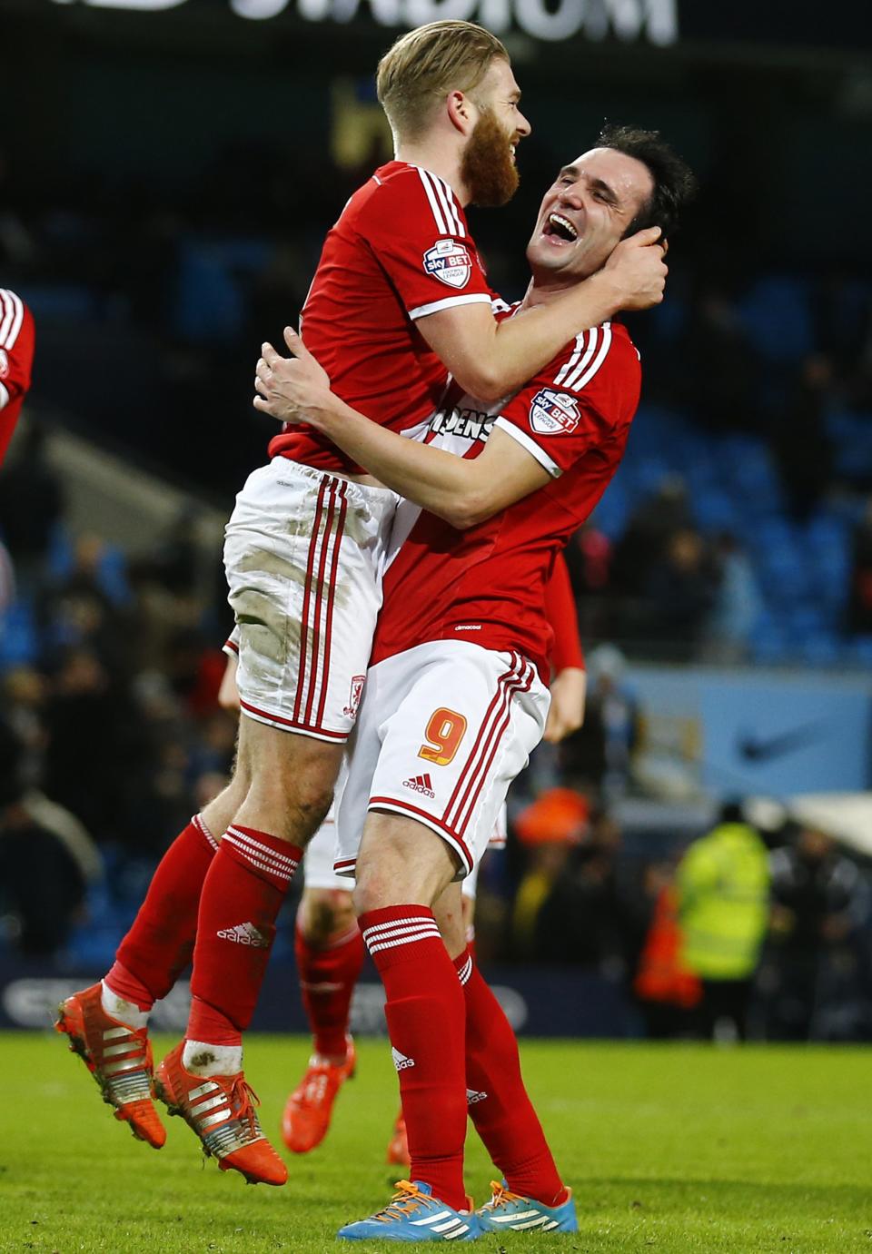 Middlesbrough's Kike (R) celebrates with Adam Clayton after beating Manchester City in their English FA Cup 4th round soccer match at the Etihad Stadium in Manchester, northern England, January 24, 2015. REUTERS/Darren Staples (BRITAIN - Tags: SPORT SOCCER)