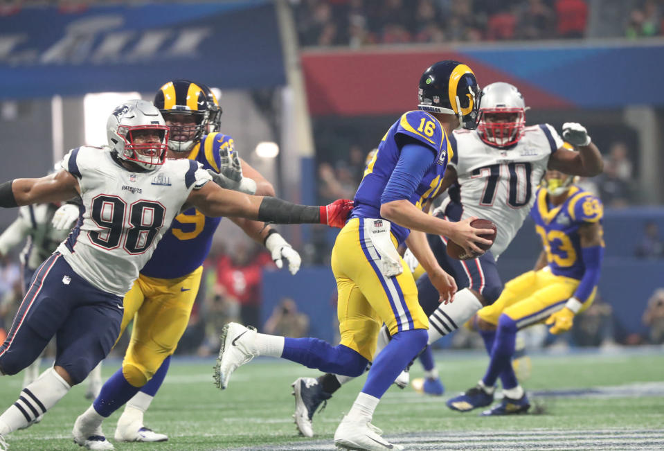 ATLANTA GA. - FEBRUARY 3:  New England Aptriot Trey Flowers chases Los Angelas Ram Jared Goff in the middle of 4th quarter of Super Bowl LIII at Mercedes-Benz Stadium on February 3, 2019 in Atlanta, GA. (Staff Photo By Nancy Lane/MediaNews Group/Boston Herald)
