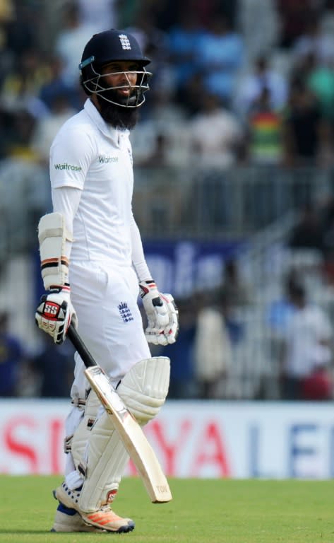 England's Moeen Ali walks back to the pavilion after his dismissal, on the second day of their fifth and final Test match against India on December 17, 2016