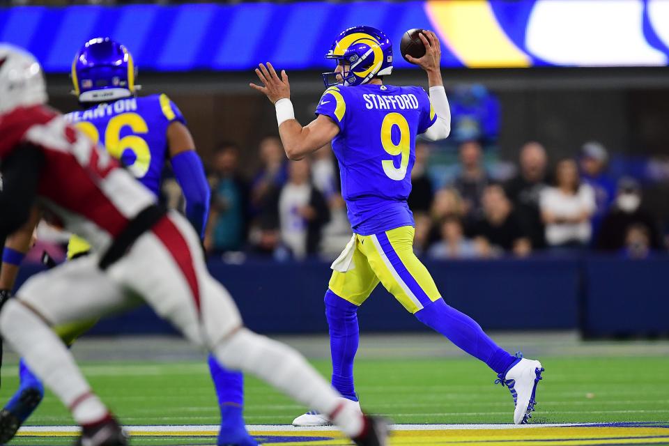 Jan 17, 2022; Inglewood, California, USA; Los Angeles Rams quarterback Matthew Stafford (9) throws against the Arizona Cardinals during the first half in the NFC Wild Card playoff football game at SoFi Stadium.