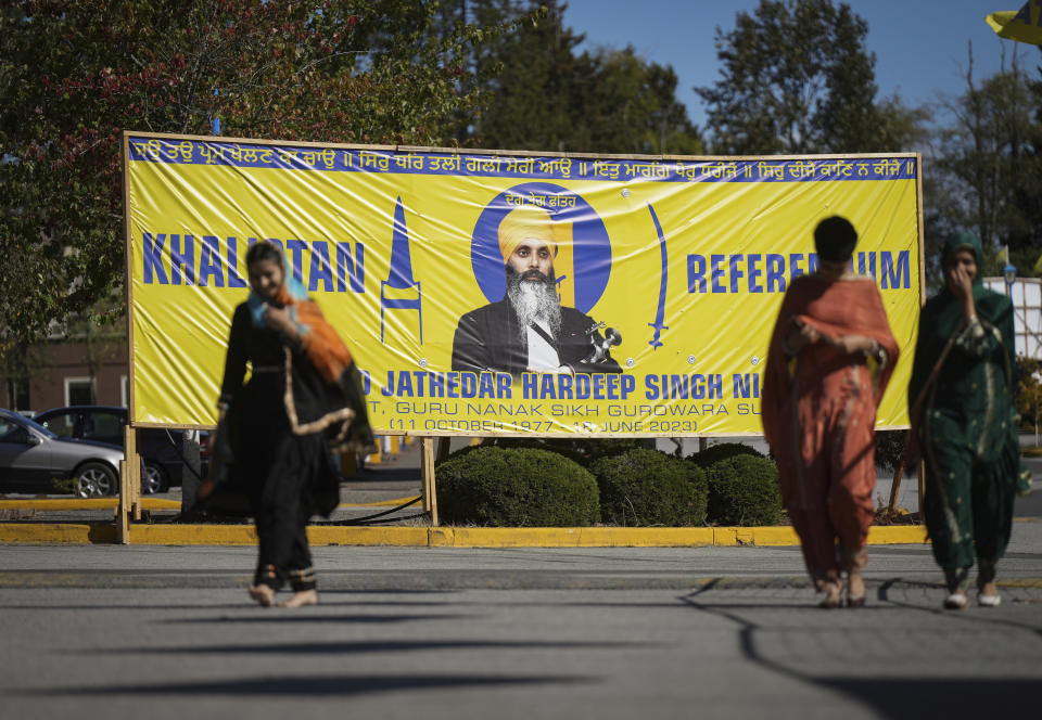 A photograph of late temple president Hardeep Singh Nijjar is seen on a banner outside the Guru Nanak Sikh Gurdwara Sahib in Surrey, British Columbia, on Monday, Sept. 18, 2023, where temple president Hardeep Singh Nijjar was gunned down in his vehicle while leaving the temple parking lot in June. Canada expelled a top Indian diplomat Monday as it investigates what Prime Minister Justin Trudeau called credible allegations that India’s government may have had links to the assassination in Canada of a Sikh activist.(Darryl Dyck/The Canadian Press via AP)