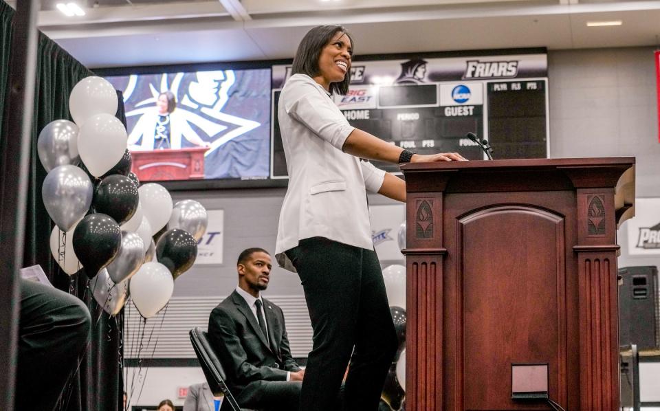 New Providence women's basketball coach Erin Batth addresses the crowd at Wednesday's introductory press conference at the college.