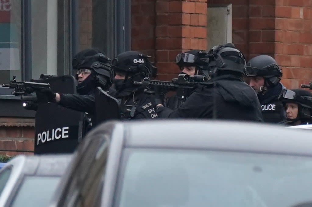 The 41-year-old is “believed to be armed”, police said  (PA)