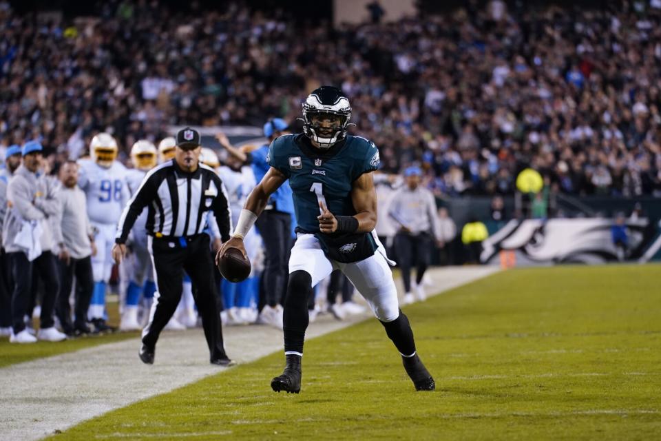 Eagles quarterback Jalen Hurts runs free against the Chargers defense.