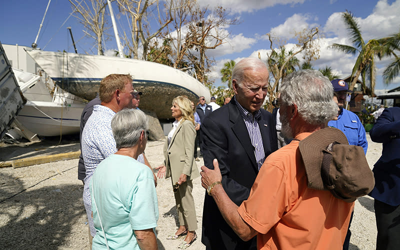 President Biden and first lady Jill Biden talk to people impacted by Hurricane Ian