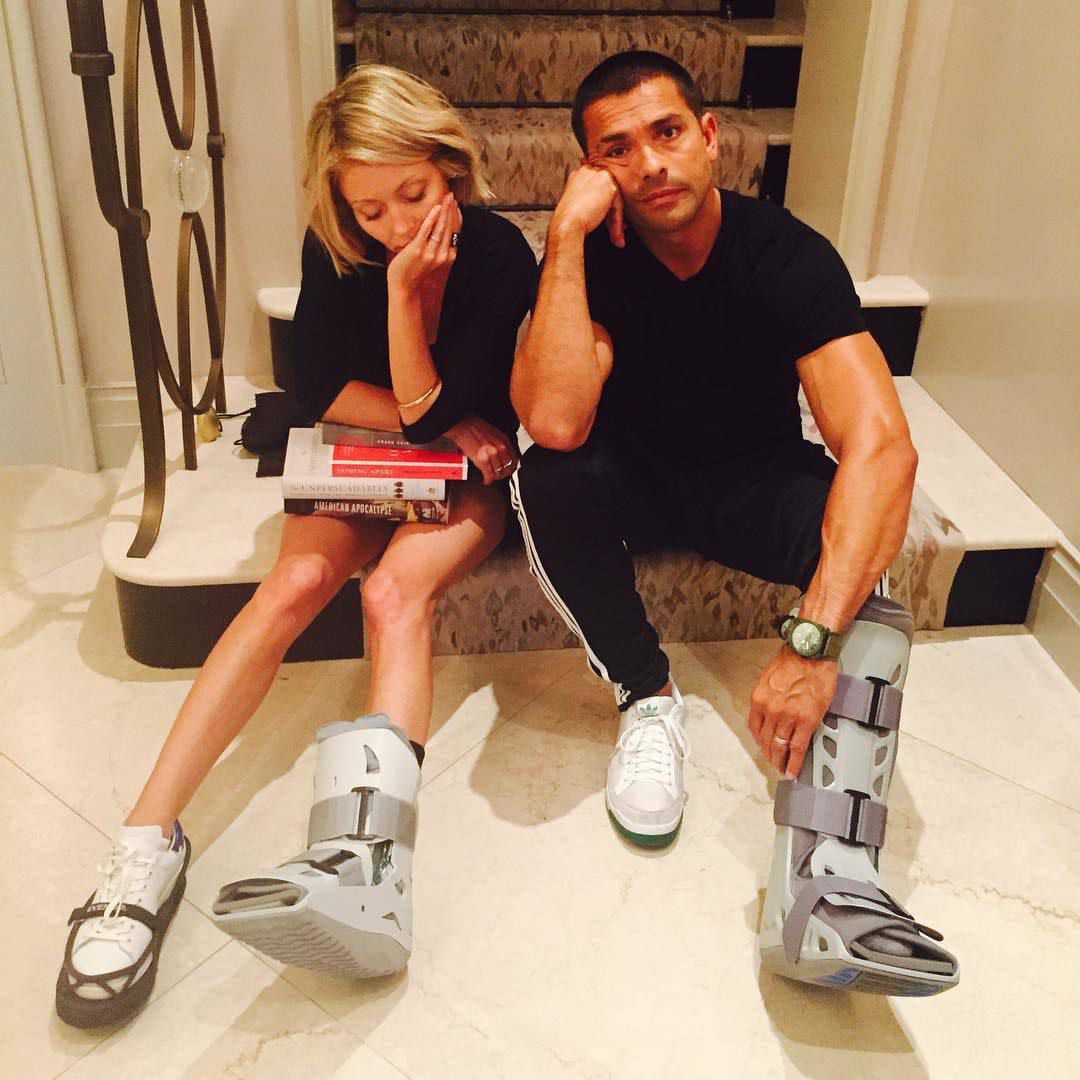 Yikes! "Live! with Kelly and Michael" host Kelly Ripa has been nursing her left foot that she injured while taking a dance class, and it seems her hubby Mark Consuelos can't do much to take care of her! "ARE YOU KIDDING ME RIGHT NOW??????????? WTF?????" the 44-year-old beauty captioned her snap on Aug. 6, 2015. Mark confirmed his new injury with the same Instagram snap saying, "Can't make this sh#! Up. Small calf tear."