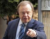 Harold Hamm, founder and CEO of Continental Resources, enters the courthouse for divorce proceedings with wife Sue Ann Hamm in Oklahoma City, Oklahoma, U.S. on September 22, 2014. REUTERS/Steve Sisney/File Photo