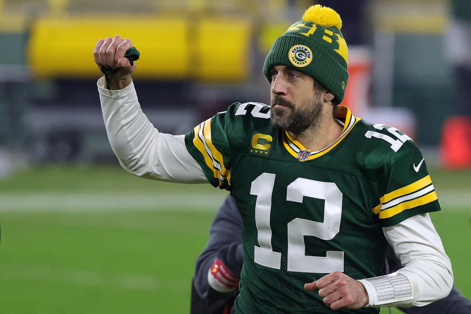 GREEN BAY, WISCONSIN - JANUARY 16: Aaron Rodgers #12 of the Green Bay Packers leaves the field following the NFC Divisional Playoff game against the Los Angeles Rams at Lambeau Field on January 16, 2021 in Green Bay, Wisconsin.  The Packers defeated the Rams 32-18. (Photo by Stacy Revere/Getty Images)