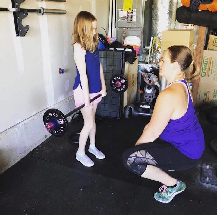 "I love coaching my 7-year-old daughter through lifting with her own child-sized barbell."