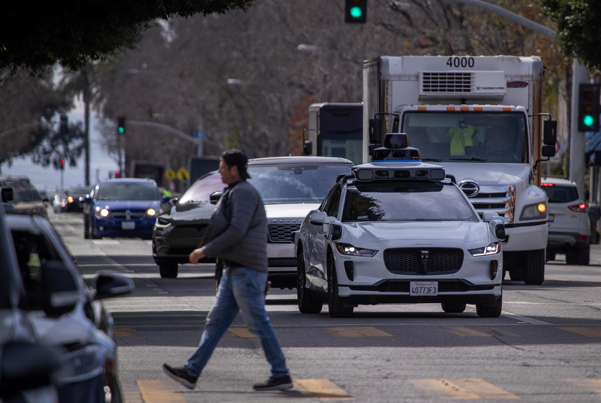 Santa Monica, CA - February 21: Passengers ride in an electric Jaguar I-Pace car outfitted with Waymo full self-driving technology in Santa Monica Tuesday, Feb. 21, 2023.  (Allen J. Schaben / Los Angeles Times via Getty Images)