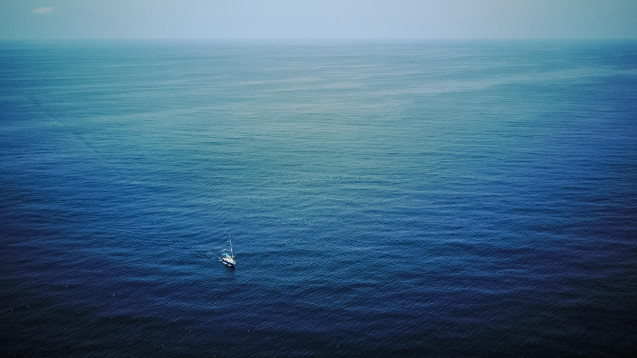 Drone shot of the Women on Waves boat in the open ocean. 