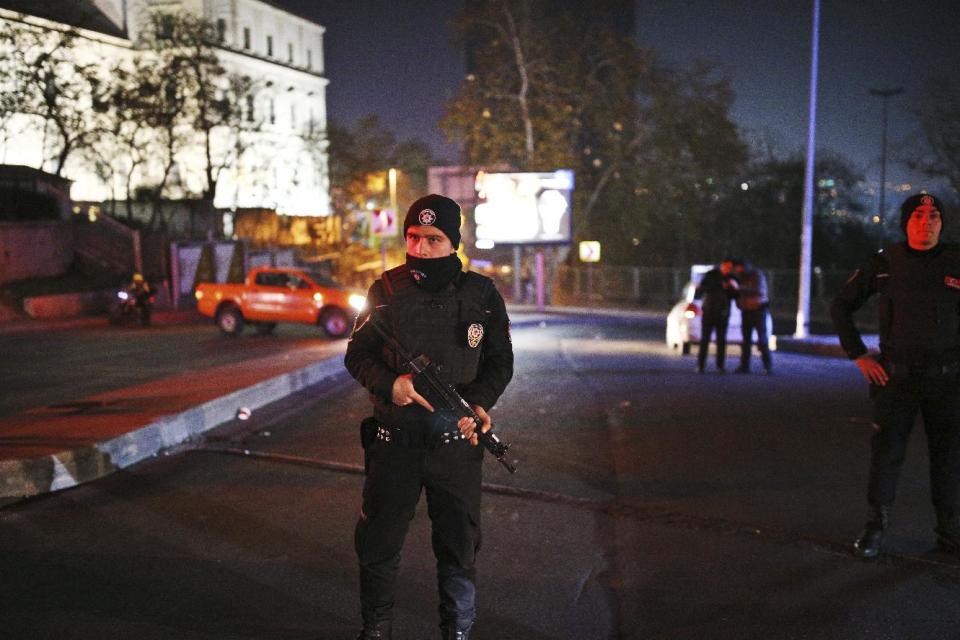 Turkish police officers cordon off the roads leading to the area of the Besiktas football club stadium, in Istanbul, late Saturday, Dec. 10, 2016. Two loud explosions have been heard near the newly built soccer stadium and witnesses at the scene said gunfire could be heard in what appeared to have been an armed attack on police. Turkish authorities have banned distribution of images relating to the Istanbul explosions within Turkey. (AP Photo/Emrah Gurel) TURKEY OUT