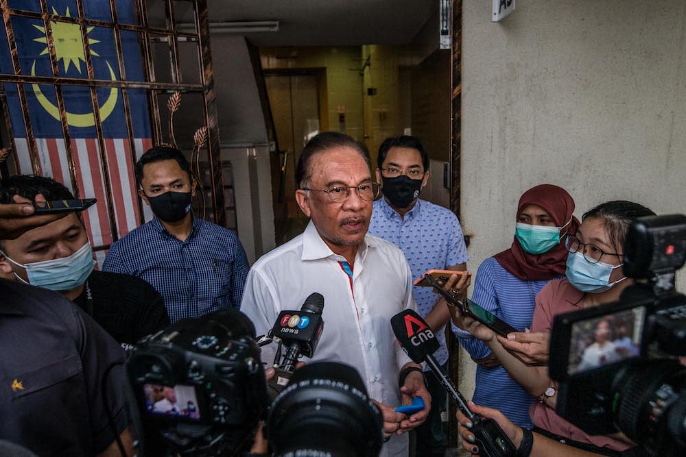 PKR president Datuk Seri Anwar Ibrahim speaks to reporters after meeting with the Pakatan Harapan presidential council in Petaling Jaya January 12, 2021. — Picture by Firdaus Latif