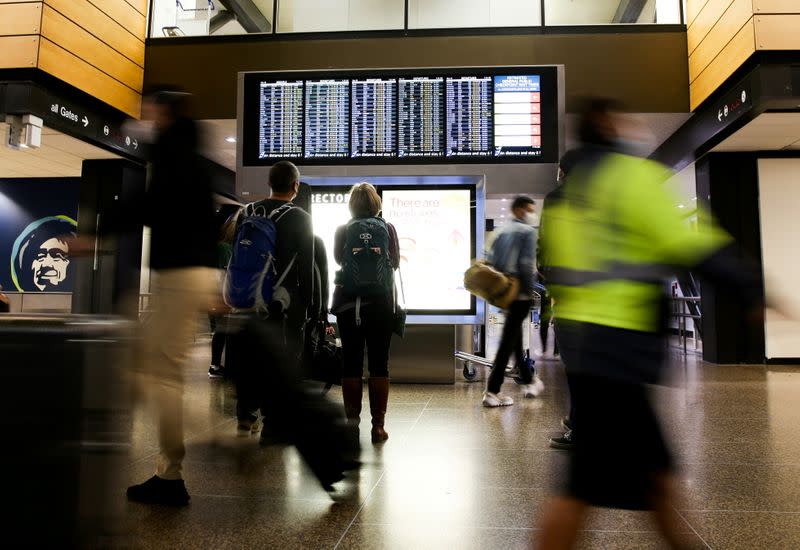 FILE PHOTO: People travel before the Thanksgiving holiday in Seattle