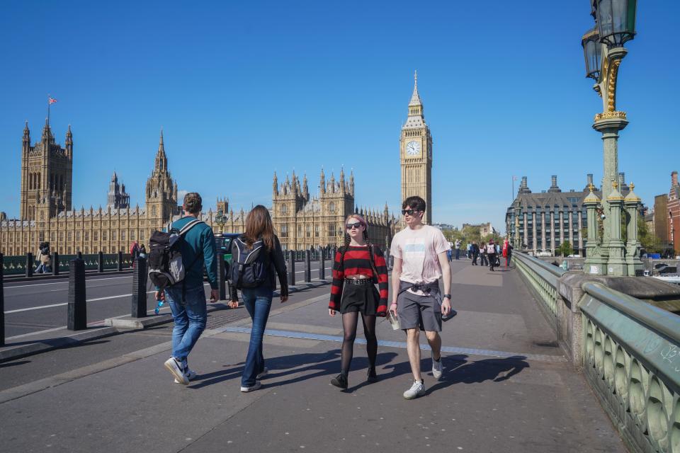 London, UK. 30  April, 2024. Pedestrians walking in the bright sunshine on Westminster Bridge this morning as the warm weather returns with temperatures forecast to reach 20celsius. Credit: amer ghazzal/Alamy Live News