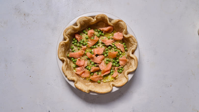 peas and salmon in quiche shell