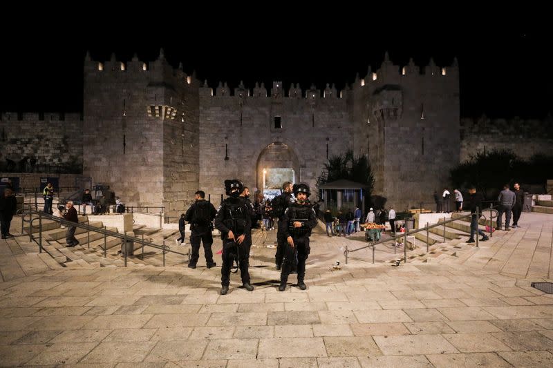 Israeli police officers stand guard outside the Damascus Gate