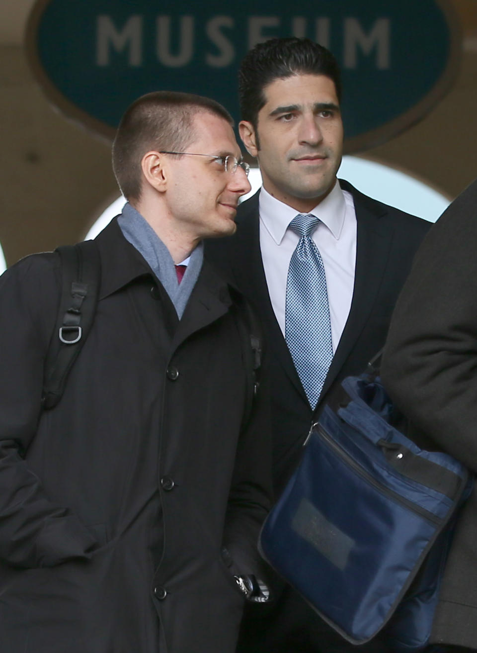 Bodyguard Avi Navama, right, of the late Russian oligarch Boris Berezovsky arrives with Michael Cotlick who was Berezovsky's lawyer at Windsor Coroner's Court, Windsor, England, Wednesday, March, 26, 2014. Berezovsky whose real name is Platon Elenin died at his home near Windsor in March 2013.(AP Photo/Alastair Grant)