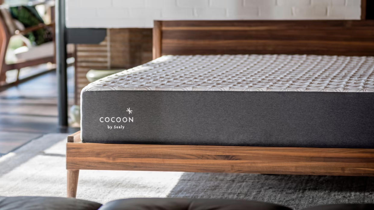  Cocoon Chill Mattress review image shows the bed placed on a wooden bed frame. 