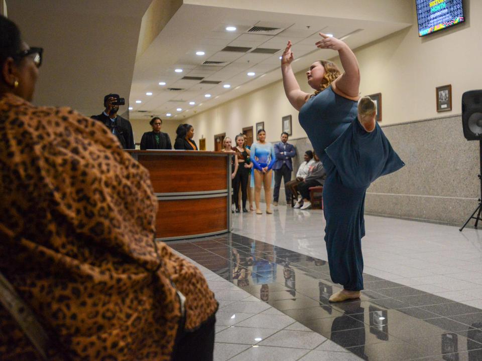 Emily Peachy performs her routinte during the third 'Celebrate Black History Month' celebration inside Jackson City Hall in Jacskon, Tenn., on Friday, Feb. 16, 2024.