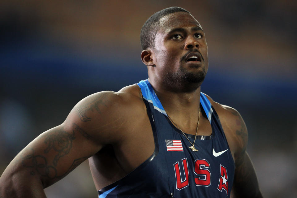 Olympic bronze medalist David Oliver of United States looks on after competing in the men's 110 metres hurdles semi finals during day three of the 13th IAAF World Athletics Championships at the Daegu Stadium on August 29, 2011 in Daegu, South Korea. Oliver's right arm features a tattoo of the Olympic rings, among others. (Photo by Andy Lyons/Getty Images)