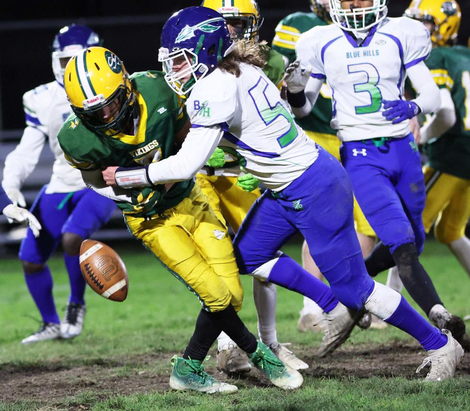 South Shore's Tyler fumbles the football while being tackled by Blue Hills Regional Technical School defender James Bennett on special teams on Thursday, Nov. 17, 2022.  