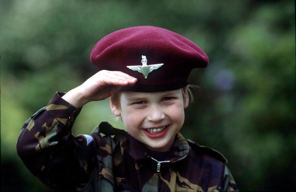 TETBURY, UNITED KINGDOM - JULY 18:  Prince William In Parachute Regiment Uniform In The Gardens Of His Home Highgrove House Saluting.  (Photo by Tim Graham Photo Library via Getty Images)