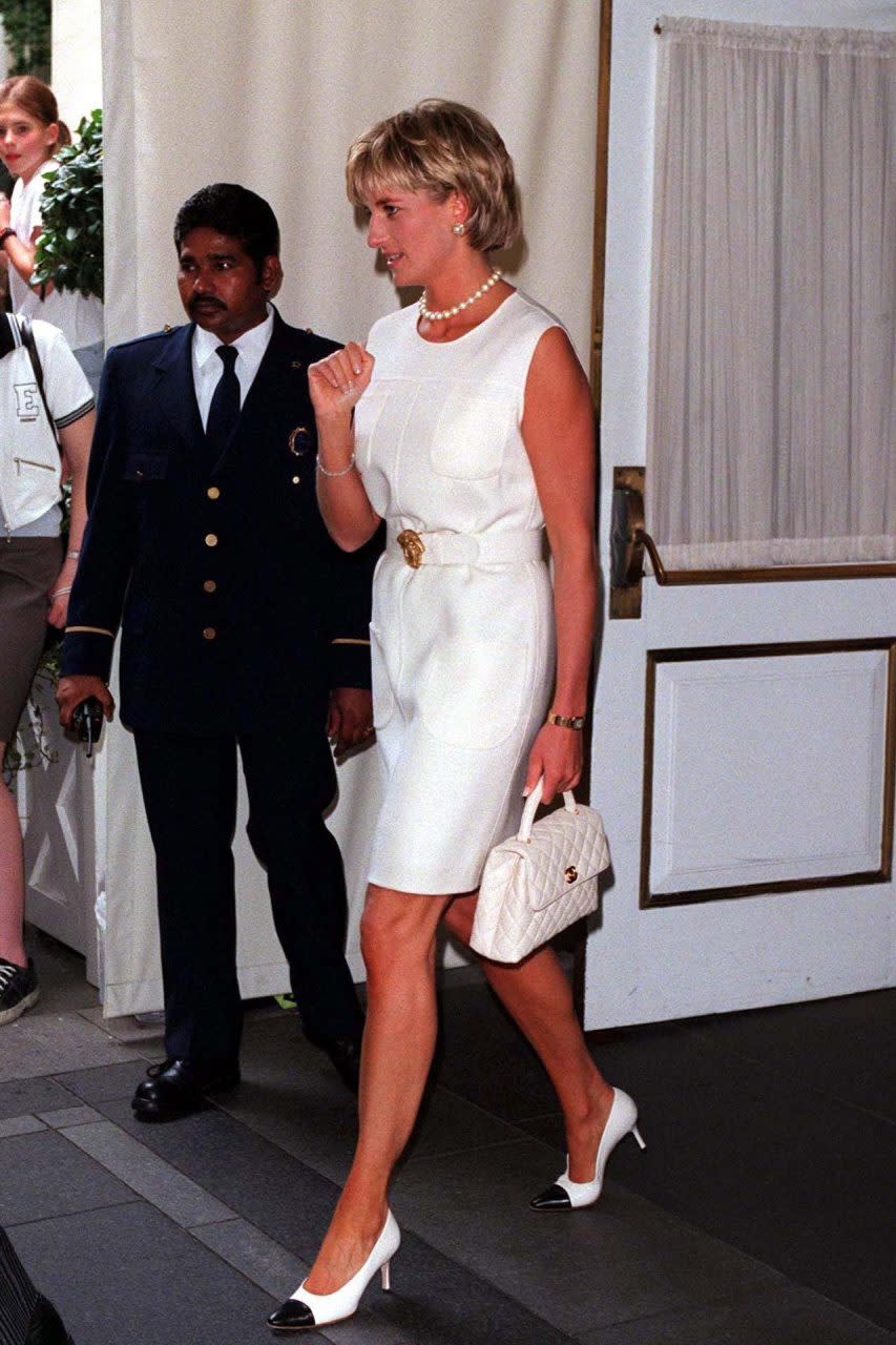 The pristine white Chanel bag bringing undeniable polish to Diana’s looks in the late ’90s. REX FEATURES