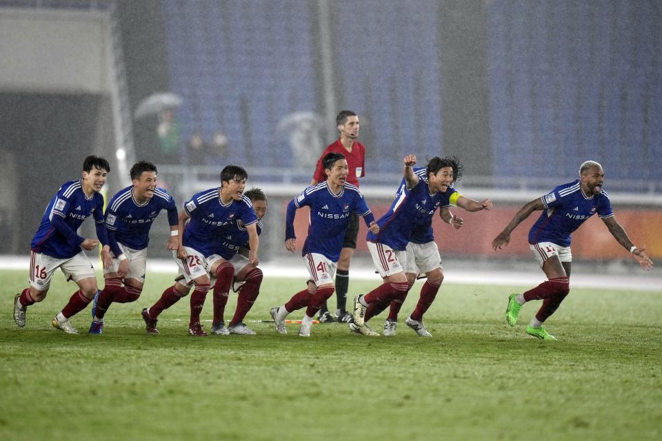 Players of Yokohama F. Marinos celebrate after a penalty kick against Ulsan Hyundai during the second leg of the AFC Champions League semifinal soccer match between Yokohama F. Marinos and Ulsan Hyundai in Yokohama, south of Tokyo, Wednesday, April 24, 2024. (AP Photo/Shuji Kajiyama)